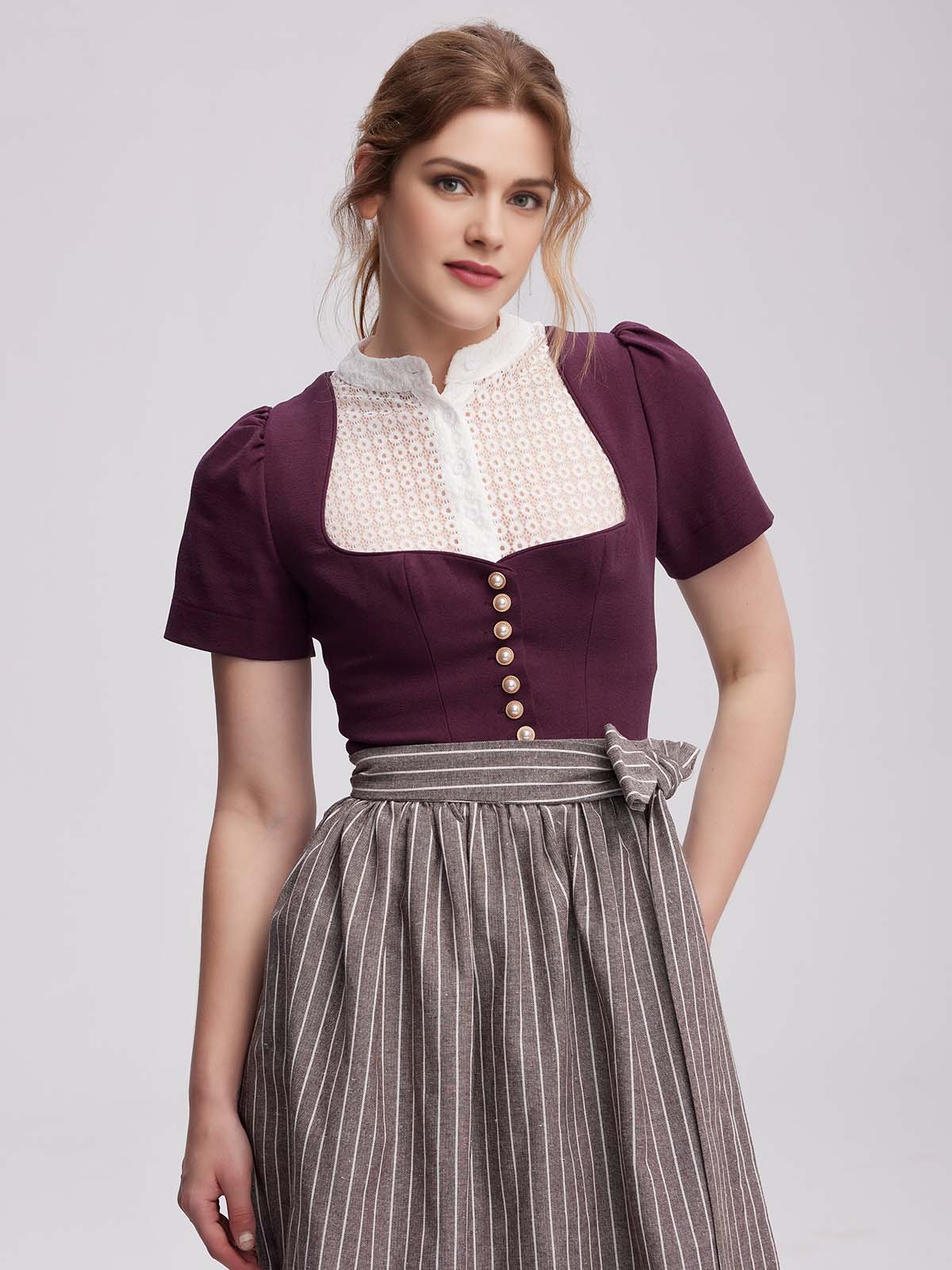 Schwarze Dirndl Bluse mit lila Dirndl